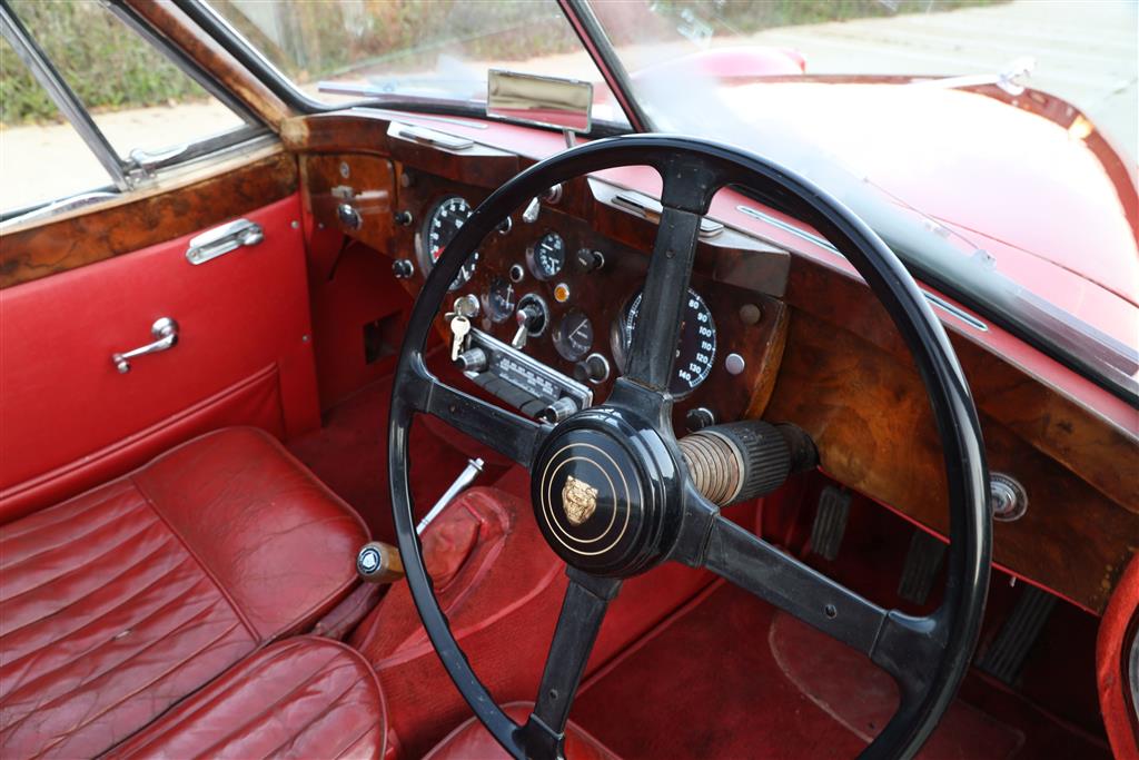 A 1955 Jaguar XK140 DHC